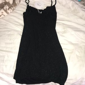 Sparkly deep green cocktail dress